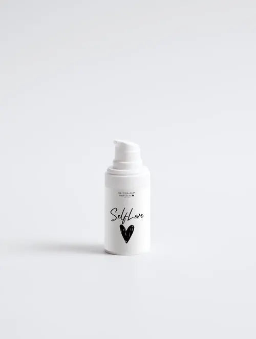 acne spot care serum in a white bottle labeled SelfLove for quick treatment of unwanted breakouts.