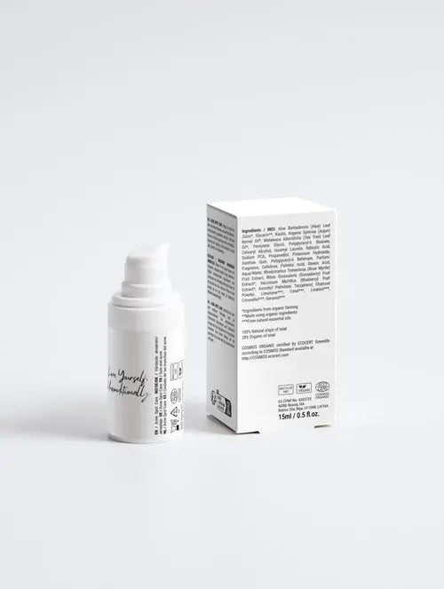 acne spot care serum in a pump bottle with packaging, helps calm skin and reduce redness from breakouts.