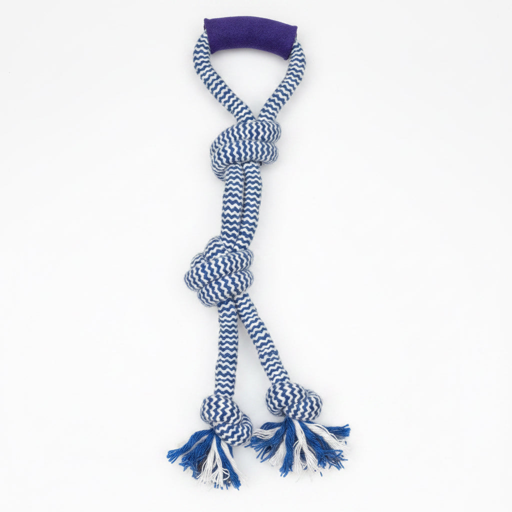winter tug dog toy with blue and white knots and a handle for interactive play