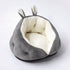 Bunny ear pet bed featuring soft plush fabric and cozy bunny ear design perfect for pets.